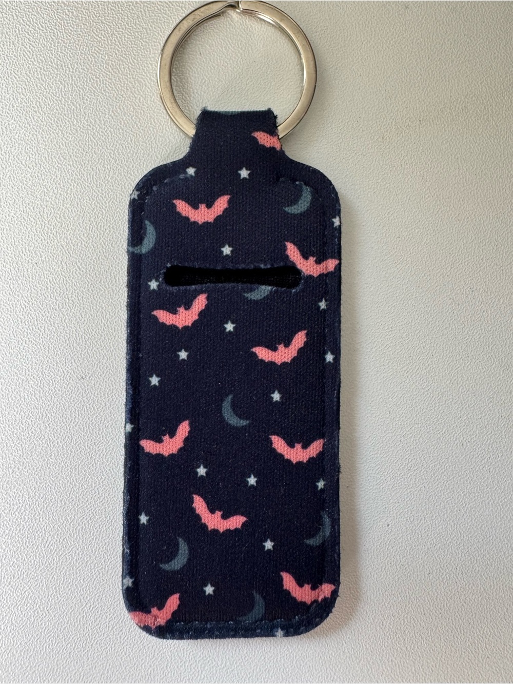 Keychain Lip Balm Holder in Navy with Pink Bat Print